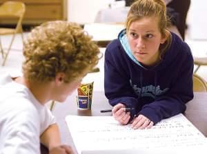 Students writing and studying