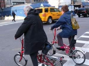 a couple on bikes