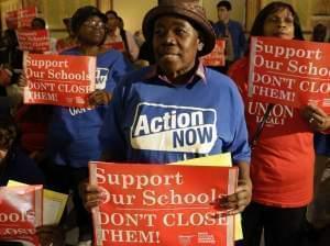 Protesters of Chicago Mayor Rahm Emmanuel's plan to close dozens of city schools