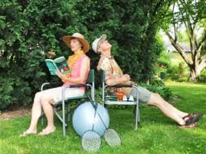 a couple sits in their backyard