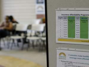 People wait to visit with volunteer counselors at Insure Central Texas on October 1 in Austin, Texas. 