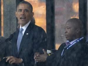 Thamsanqa Jantjie, 34, appeared alongside President Obama and other world leaders during Tuesday's memorial for Nelson Mandela in Johannesburg, South Africa. Many in the deaf community are outraged over Jantjie's sign language interpretatio