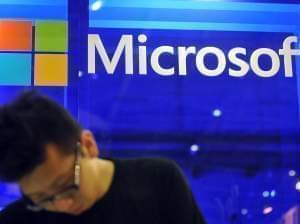 An employee stands at the Microsoft booth during the 2013 Computex in Taipei on June 4, 2013.