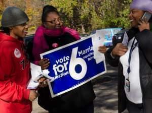 Karess, Sam and volunteer on Election Day.