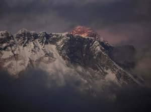 The sun shines on the peak of Mount Everest in this October 2011 photo. On Friday, an avalanche killed at least 12 Sherpas on the mountain.