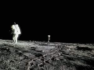 An Apollo 12 astronaut makes footprints on the surface of the moon, Nov. 19, 1969. Rocks collected on the mission were among those recently re-examined by a team of German astronauts.