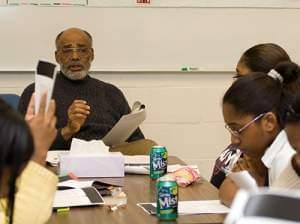 Students read while leon dash instructs