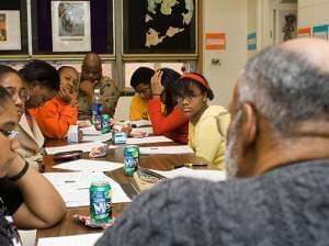 students listening to leon dash