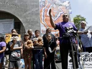 An activist speaks during a rally for immigrant rights in San Diego.