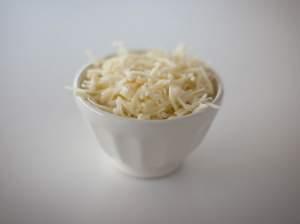 You can find wood pulp in several brands of packaged shredded cheese. It helps keep the cheese from clumping.