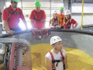 Colin Ebbers, 19, of Dakota, Ill. volunteers to be the victim of a grain bin fall during a demonstration by Stateline Farm Rescue, based in Orangeville, Ill.