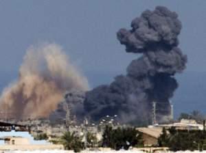 A picture taken from the Israeli border with the Gaza Strip shows smoke billowing from the coastal Palestinian enclave following an Israeli airstrike Wednesday.