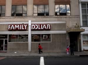 People shop outside of a Family Dollar discount store in Waterbury, Connecticut.