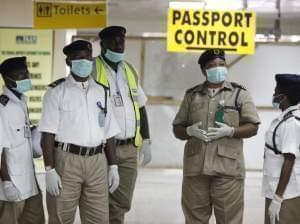 August 4 file photo of Nigerian port health officials. 