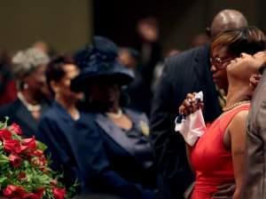 Lesley McSpadden is comforted during funeral for her son, Michael Brown.