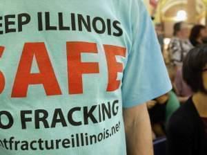 A protester attends a rally on fracking in Springfield in May 2013.