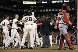 Cardinals catcher Tony Cruz leaves the field in the Giants' 6-3 victory Thursday in San Francisco.