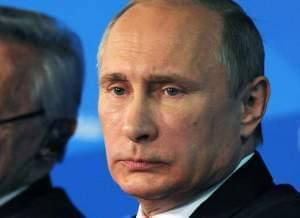 Vladimir Putin attends a conference of political experts in Sochi, Russia.