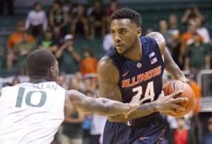 Illini Rayvonte Rice looks for an open teammate past Miami guard Sheldon McClellan.