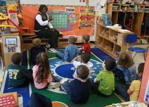 teacher in a classroom with kids