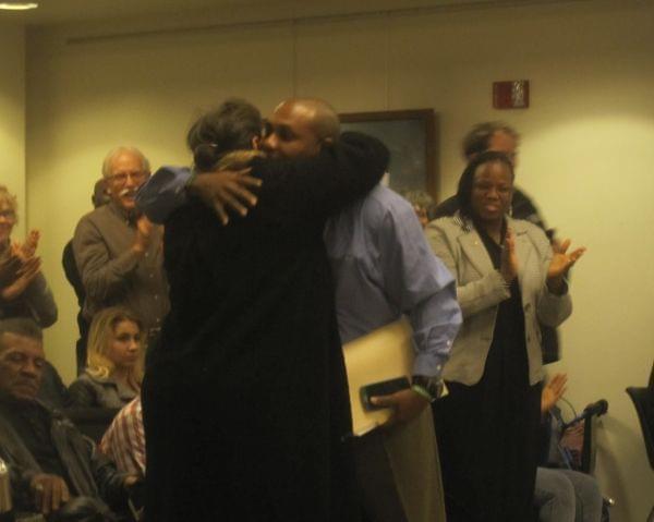 Aaron Ammons before being sworn in Monday to the Urbana City Council.