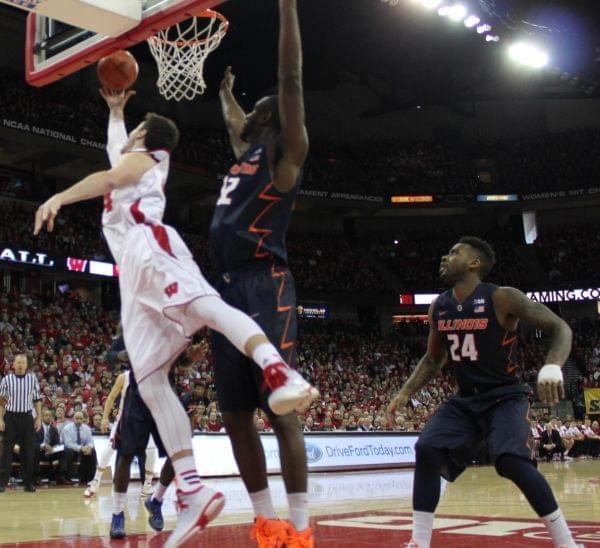isconsin's Frank Kaminsky goes around illinois' Nnanna Egwu for a lay-up.