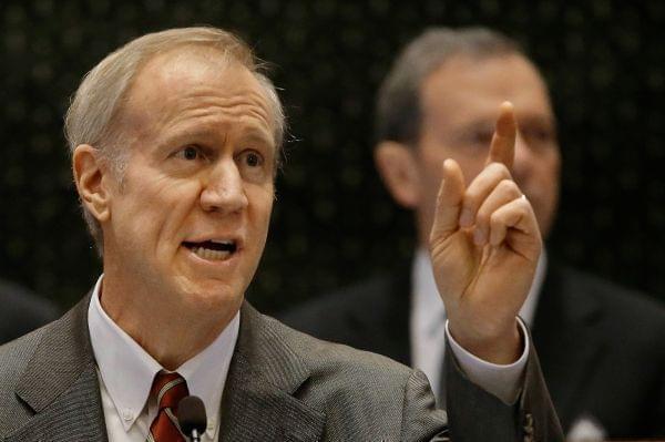 Illinois Gov. Bruce Rauner delivers his State of the Budget address to a joint session of the General Assembly in the House chambers, Wednesday, Feb. 18, 2015, in Springfield Ill.