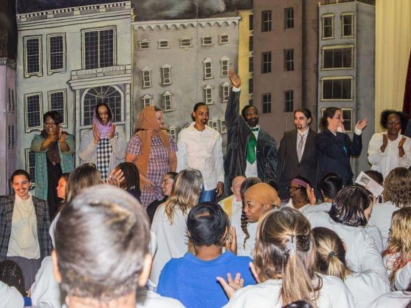 Inmates at the Decatur Correctional Center give a standing ovation to the cast of Macbeth on opening night, Wednesday, April 22