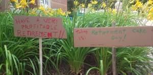 Signs wishing a happy retirement to Dave Dickey, placed by well-wishers on Friends Plaza outside the WILL studios on the University of Illinois Urbana campus. 