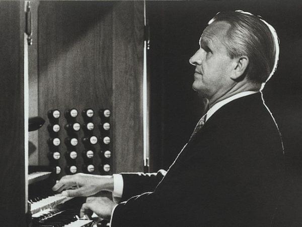A man sitting at a piano