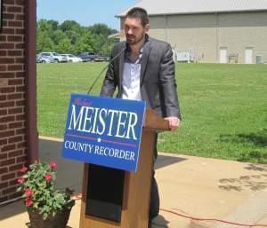 Rob Meister of Champaign announces his candidacy for county recorder outside his restaurant, Minneci's, in Champaign Tuesday.