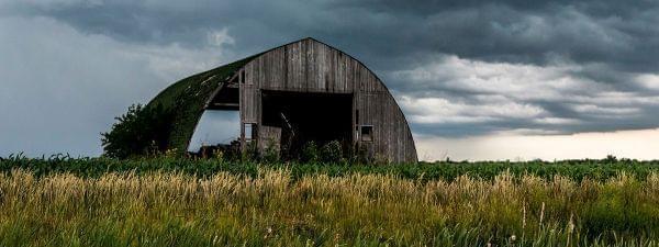 A storm hovers over an Illinois rural landscape