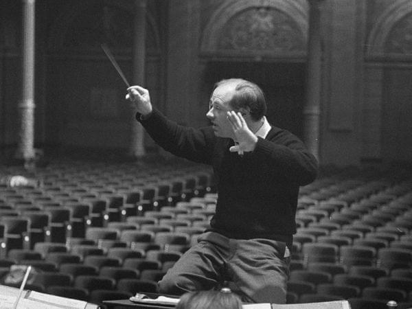 A man conducting an orchestra