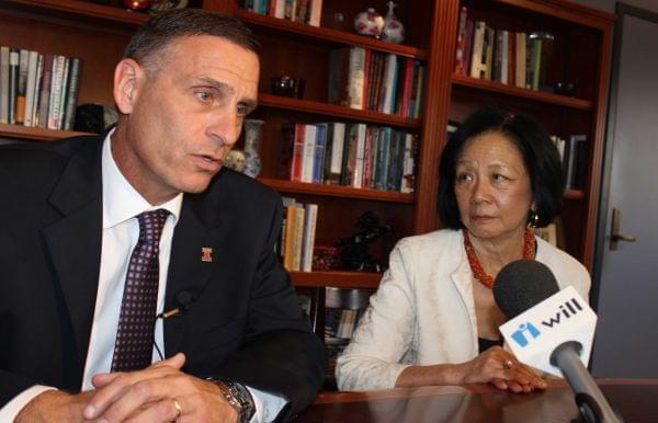 U of I Athletic Director Mike Thomas and Urbana Chancellor Phyllis Wise address reporters in her  campus office in Champaign Monday.