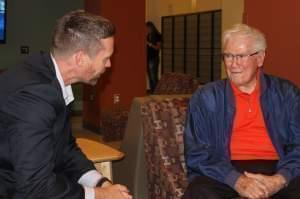 U.S. Rep. Rodney Davis visits with Tim Nugent at Nugent Hall on the U of I campus Saturday.