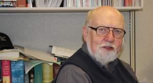 John Frayne, seated at his desk at WILL-FM. Frayne is stepping down as host of "Classics by Request" after 30 years, but will continue with "Classics of the Phonograph".