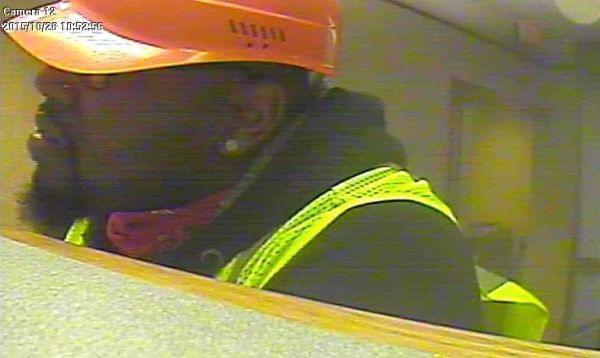 Surveillance camera screenshot of suspect in October 28 armed robbery of First Financial Bank on South Prospect Avenue in Champaign.