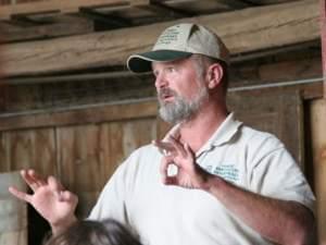 Portrait of Mark Shepard speaking to an audience