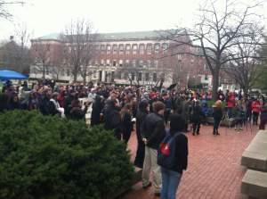 students gather outside the quad at the U of I Urbana campus to show support for black students on campus.