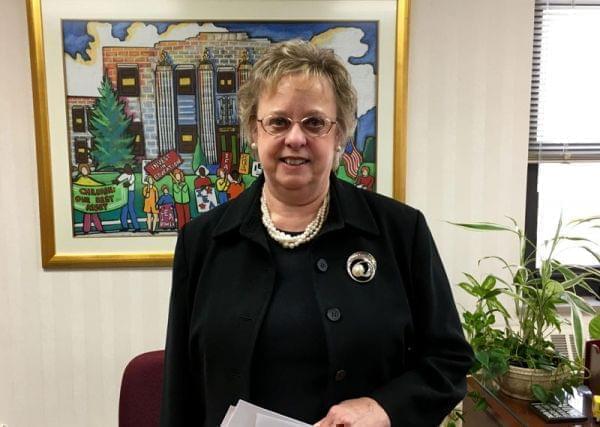 Cinda Klickna standing in an office.