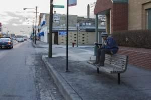 Kasey sitting on a bench.