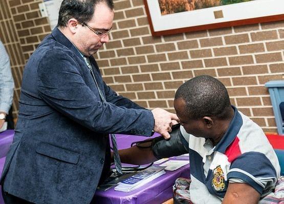 A community member at a blood pressure check-up