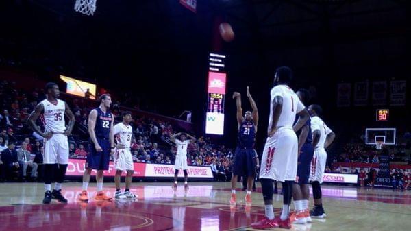 Malcolm Hill shoots free throws.