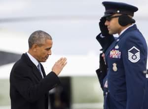 President Barack Obama returns a salute as he boards Air Force One before his departure from Andrews Air Force Base, Md.,Wednesday.  He's headed to Springfield. 