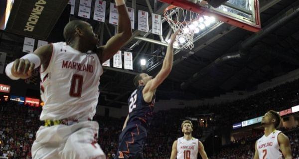 Illini basketball player Maverick Morgan making a layup.