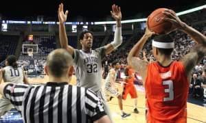 Photo caption: Illini Khalid Lewis looks to inbound the ball against Penn State's Jordan Dickerson.