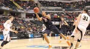 Malcolm Hill launches a shot against Purdue. 