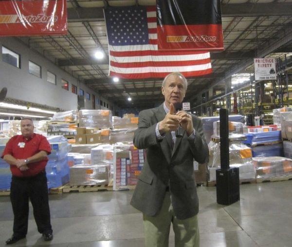 Gov. Bruce Rauner at an AutoZone distribution facility in Danville
