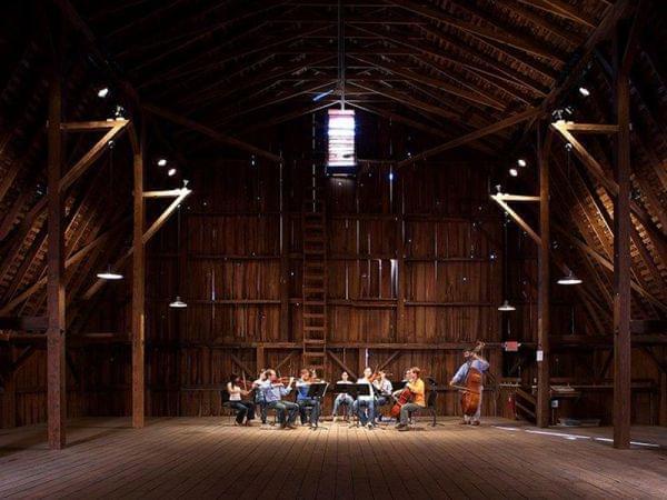 band performing in barn