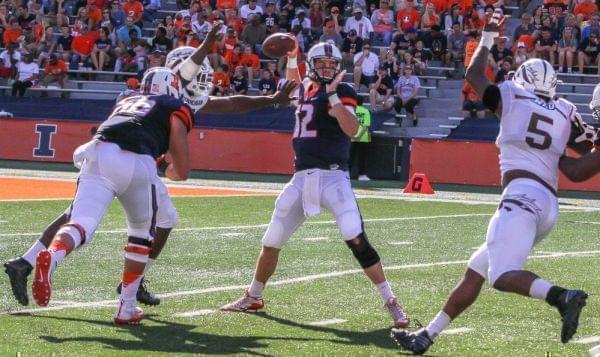 Western Michigan defenders close in on Illini quarterback Wes Lunt. 